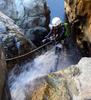 Judit crossing the waterfall